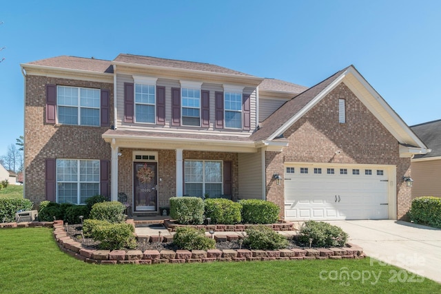 view of front of home featuring concrete driveway, an attached garage, brick siding, and a front yard