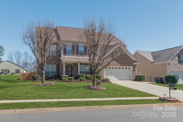 traditional-style home featuring a front lawn, an attached garage, brick siding, and driveway