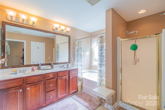 full bath featuring a bath, visible vents, a shower stall, and a sink