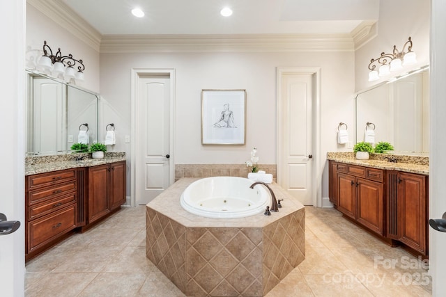 bathroom with a jetted tub, tile patterned flooring, two vanities, and crown molding