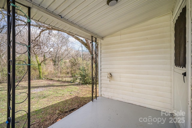 view of patio featuring fence