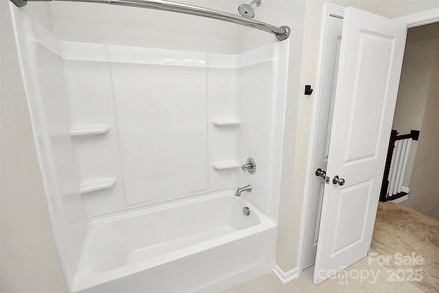 bathroom featuring shower / bathtub combination and tile patterned floors