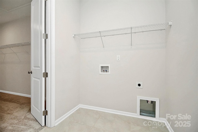 laundry room featuring hookup for a washing machine, laundry area, electric dryer hookup, and baseboards