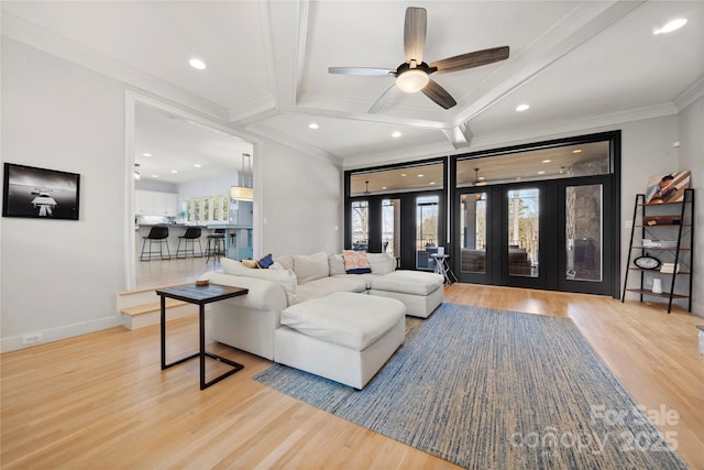 living room with recessed lighting, beamed ceiling, ornamental molding, and wood finished floors