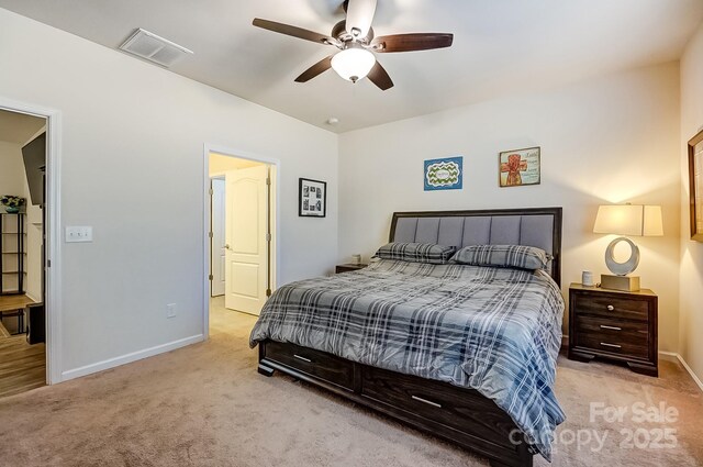 bedroom featuring ceiling fan, carpet, visible vents, and baseboards