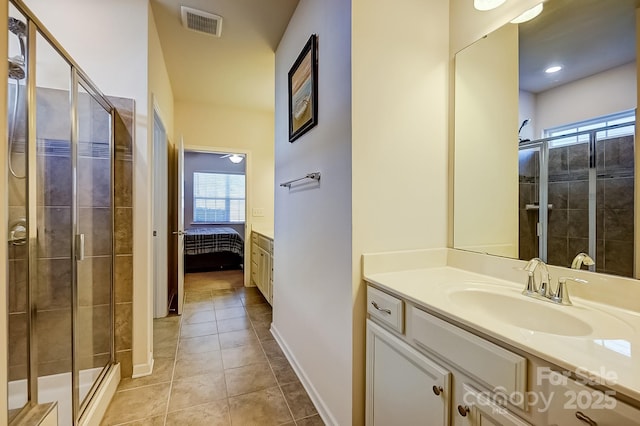 full bathroom with tile patterned flooring, connected bathroom, visible vents, vanity, and a shower stall