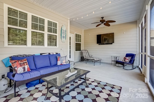 view of patio / terrace featuring a ceiling fan and an outdoor hangout area