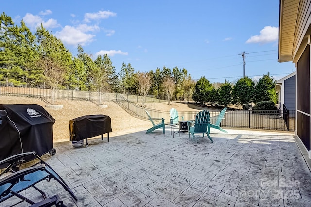 view of patio / terrace with a fenced backyard and area for grilling