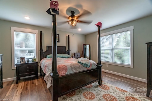 bedroom featuring recessed lighting, ceiling fan, baseboards, and wood finished floors