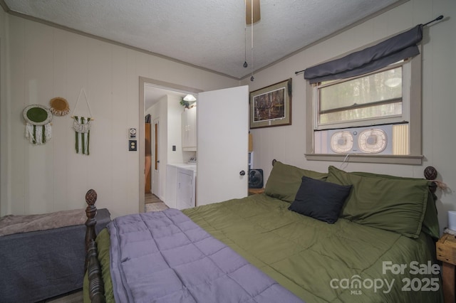 bedroom with ornamental molding, independent washer and dryer, a textured ceiling, and ceiling fan