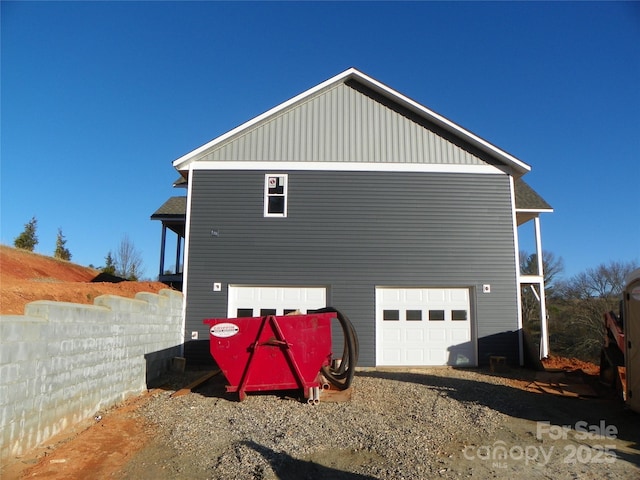 view of home's exterior with fence