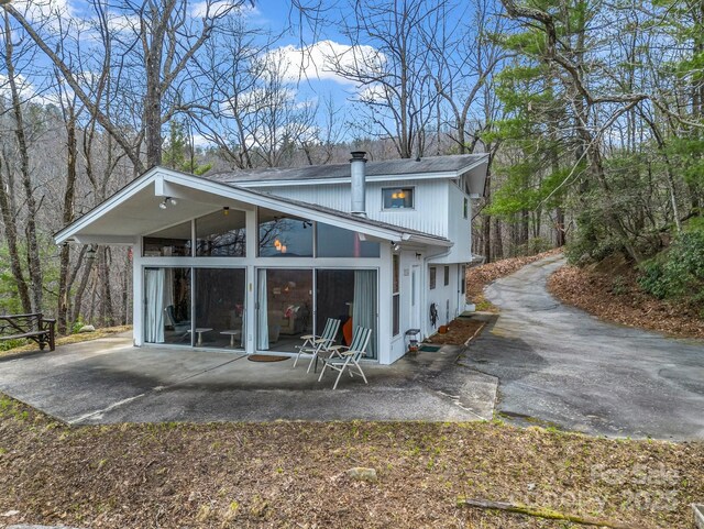 675 Foster Hill Dr, Hendersonville, NC 28739 - rear view of house with a patio