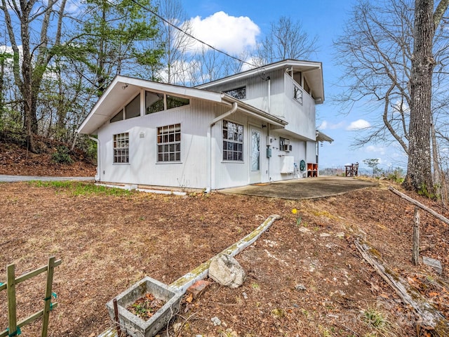 675 Foster Hill Dr, Hendersonville, NC 28739 - view of home's exterior featuring a vegetable garden