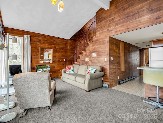 675 Foster Hill Dr, Hendersonville, NC 28739 - carpeted living room with lofted ceiling with beams, a baseboard heating unit, stairway, wood walls, and a baseboard radiator