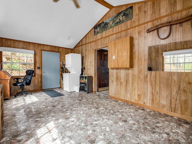 675 Foster Hill Dr, Hendersonville, NC 28739 - interior space with beamed ceiling, wood walls, high vaulted ceiling, and a ceiling fan