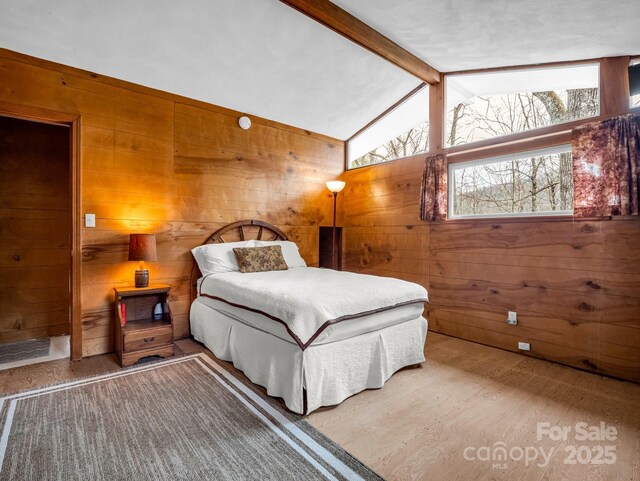 675 Foster Hill Dr, Hendersonville, NC 28739 - bedroom with wooden walls and vaulted ceiling with beams