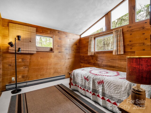 675 Foster Hill Dr, Hendersonville, NC 28739 - bedroom with a baseboard heating unit, lofted ceiling, and wooden walls