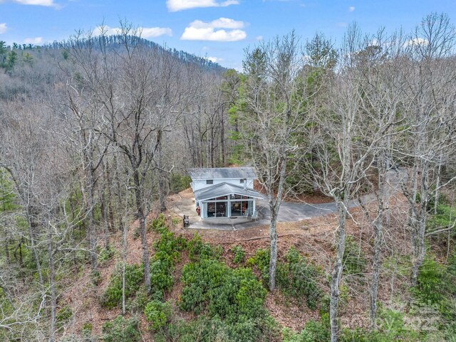 675 Foster Hill Dr, Hendersonville, NC 28739 - birds eye view of property with a wooded view