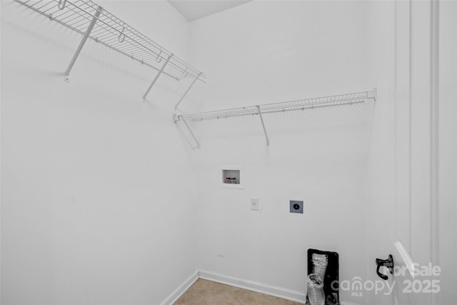 laundry room with laundry area, washer hookup, electric dryer hookup, and baseboards