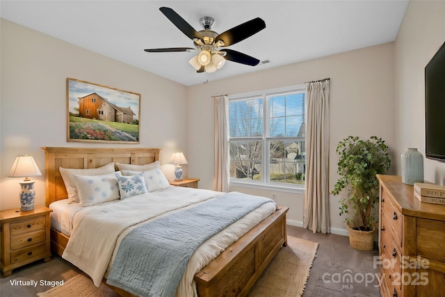 bedroom featuring ceiling fan, carpet floors, visible vents, and baseboards