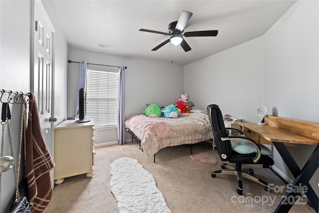 bedroom with light carpet, baseboards, visible vents, and a ceiling fan