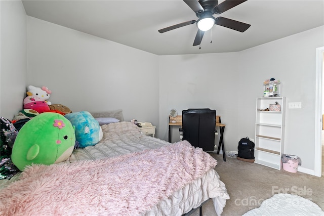 bedroom with carpet, ceiling fan, and baseboards