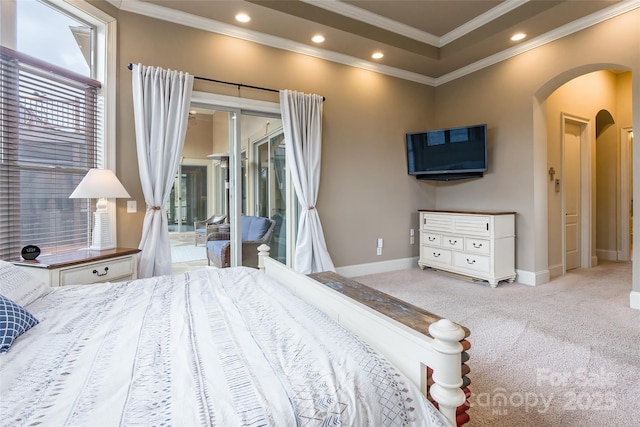 carpeted bedroom featuring access to exterior, arched walkways, baseboards, and recessed lighting