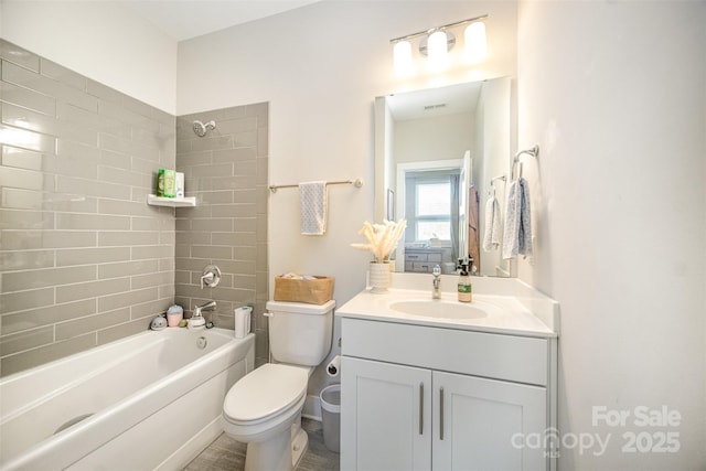 bathroom featuring vanity, shower / bathing tub combination, toilet, and visible vents