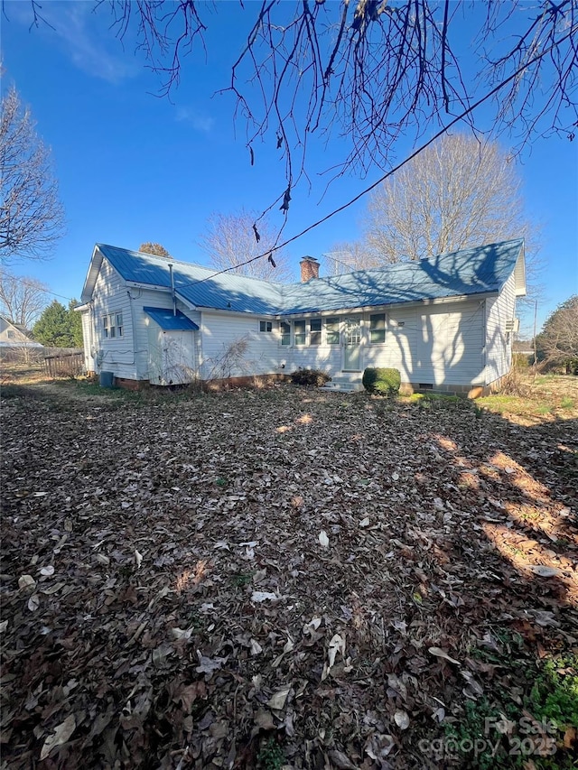 view of home's exterior with fence