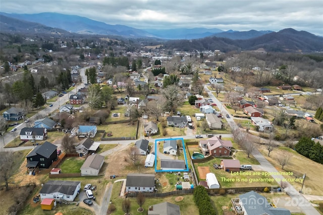 aerial view featuring a mountain view and a residential view