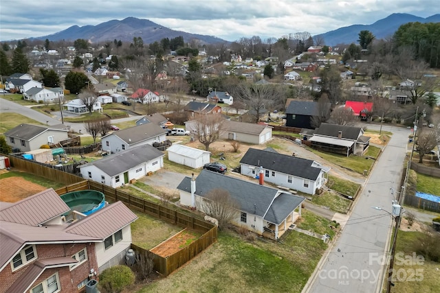 bird's eye view with a residential view and a mountain view