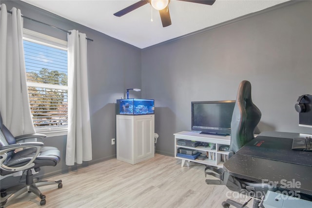 office area with ceiling fan, wood finished floors, and baseboards