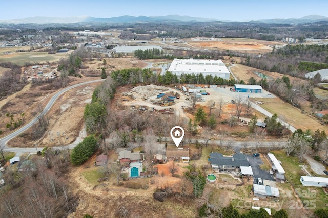 aerial view featuring a mountain view