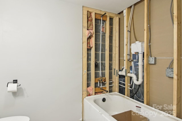 bathroom featuring a tub to relax in