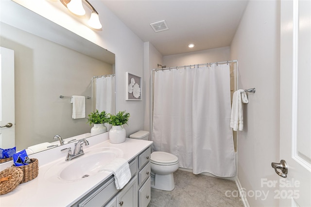 full bath with vanity, toilet, visible vents, and tile patterned flooring