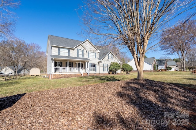 view of front of home featuring a porch and a front yard