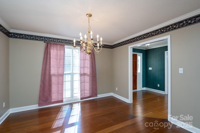 280 Bonaventure Dr, Salisbury, NC 28147 - empty room with baseboards, wood finished floors, an inviting chandelier, crown molding, and a textured ceiling