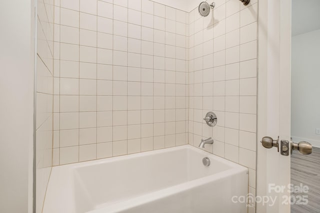 bathroom featuring shower / bath combination