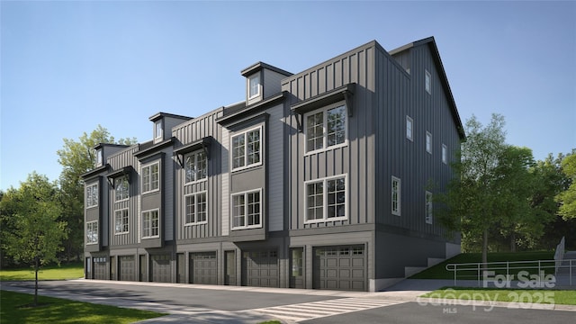 view of property exterior featuring an attached garage and board and batten siding