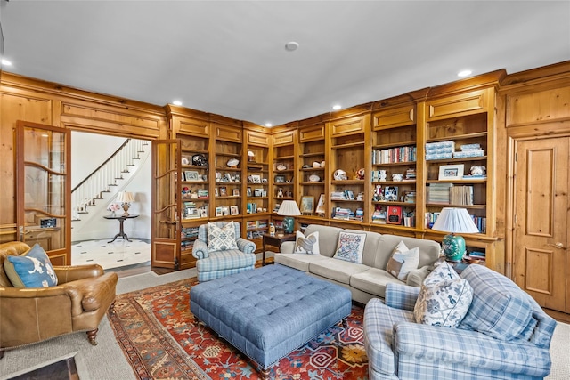 living room featuring stairway and recessed lighting