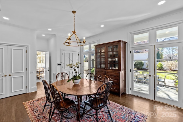 dining area with french doors, dark wood-style flooring, and recessed lighting