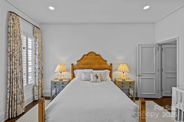 bedroom with ornamental molding, wood finished floors, and recessed lighting