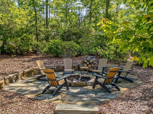 1905 White Tree Trl, Arden, NC 28704 - view of patio / terrace with a fire pit