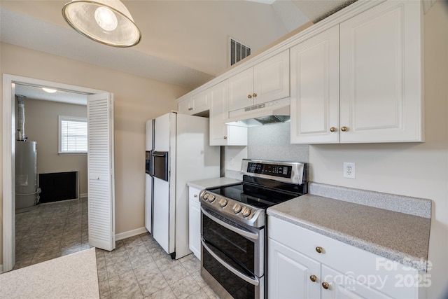 kitchen with visible vents, under cabinet range hood, double oven range, white refrigerator with ice dispenser, and white cabinetry