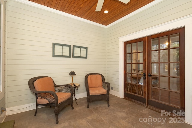 sitting room with crown molding, recessed lighting, a ceiling fan, french doors, and wooden ceiling