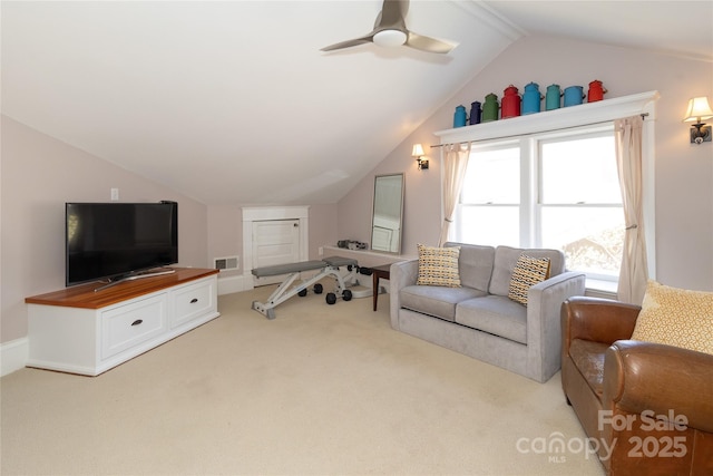carpeted living room featuring vaulted ceiling and ceiling fan