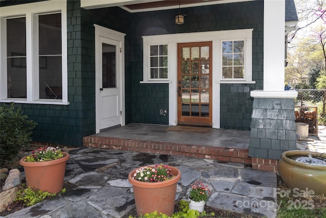 property entrance with a porch