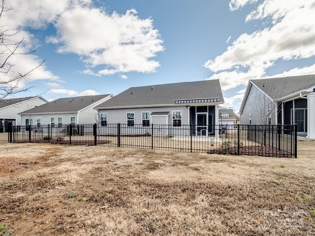 back of property with a patio and fence