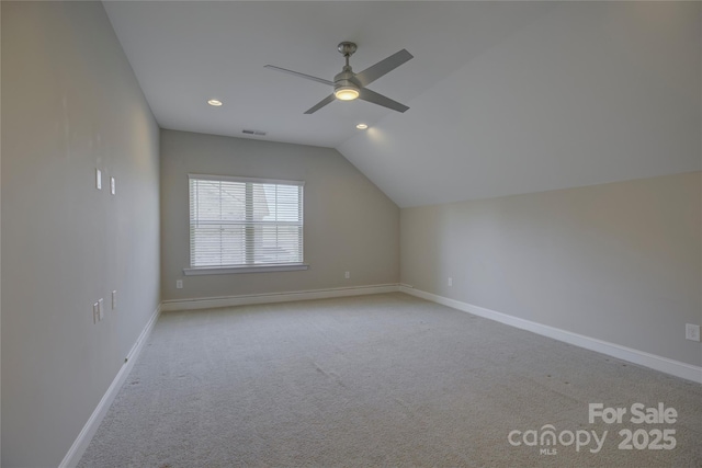 17809 Pawleys Plantation Ln, Charlotte, NC 28278 - bonus room with visible vents, lofted ceiling, a ceiling fan, baseboards, and light colored carpet