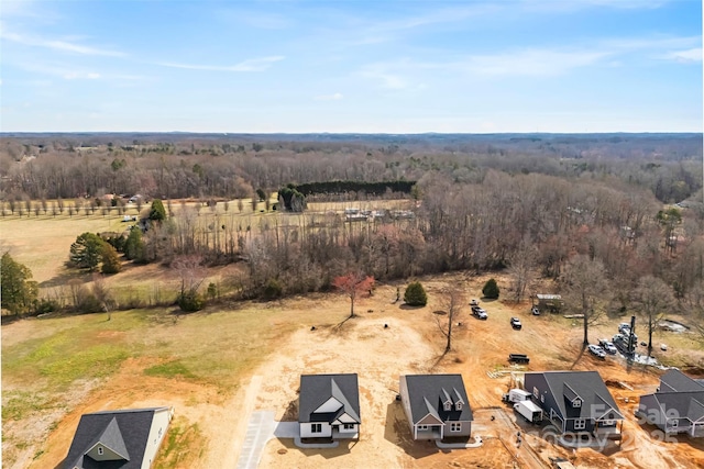 aerial view featuring a rural view and a forest view